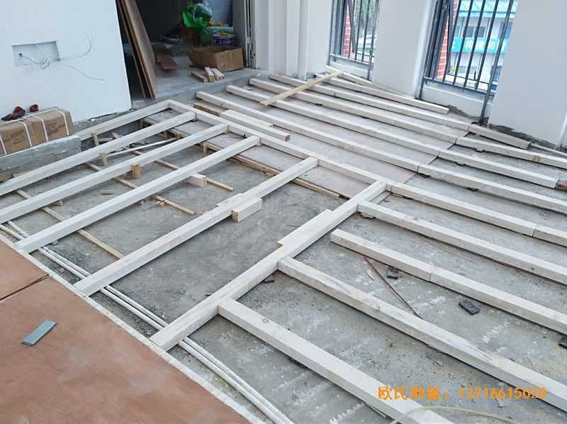 重慶重光小學(xué)籃球館運(yùn)動(dòng)地板施工案例1